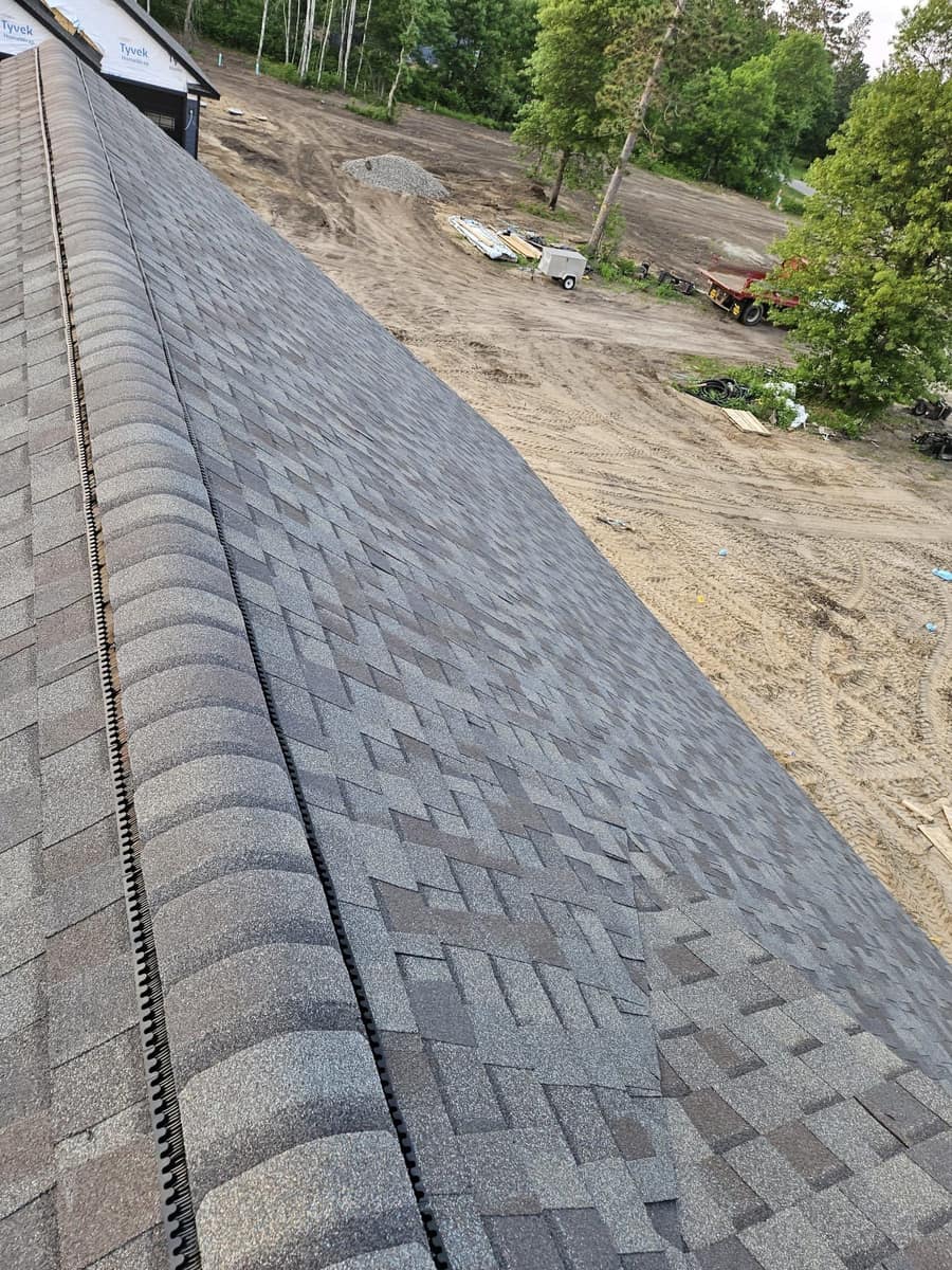 New ridge cap shingles on a roof in Brainerd, MN