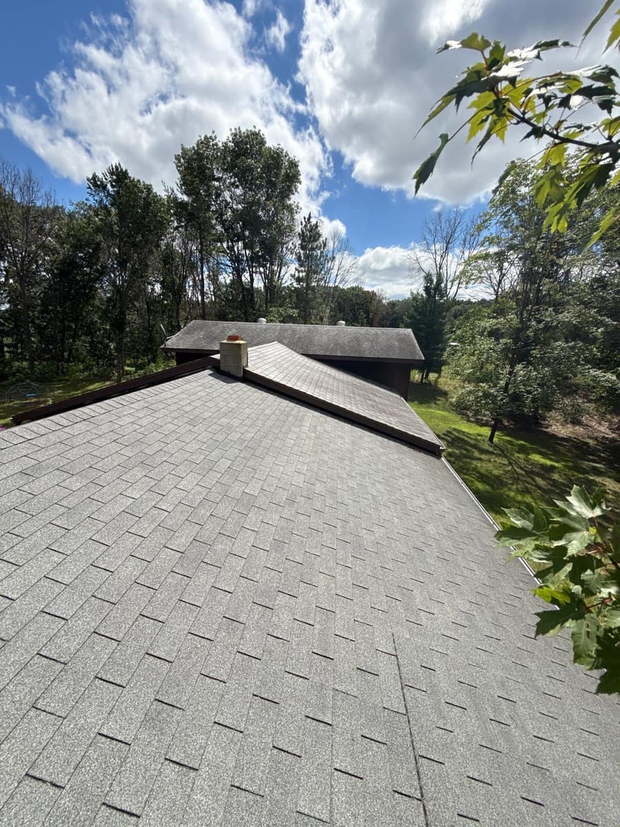 New gray shingle roof on a home in Little Falls, MN