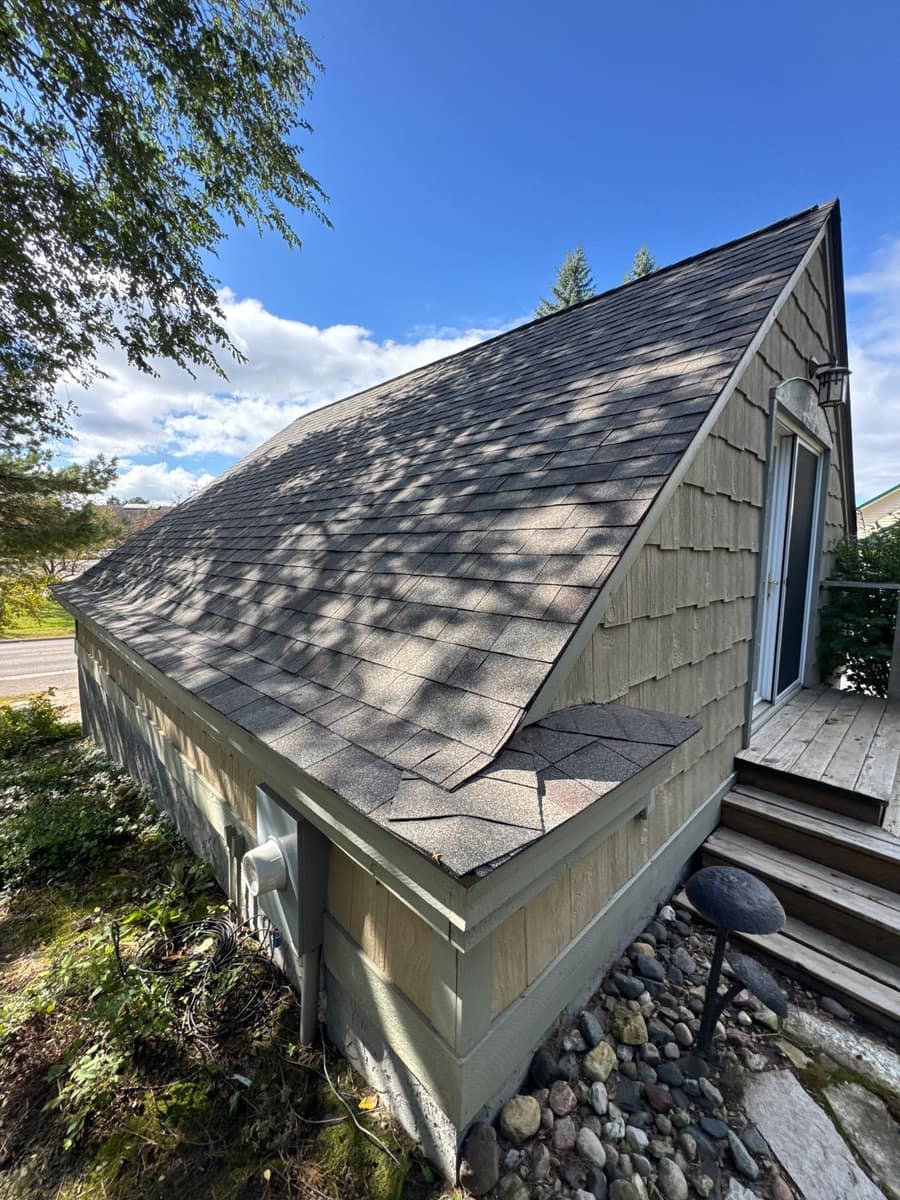 New shingle roof over a cedar-sided home in Minnetonka, MN