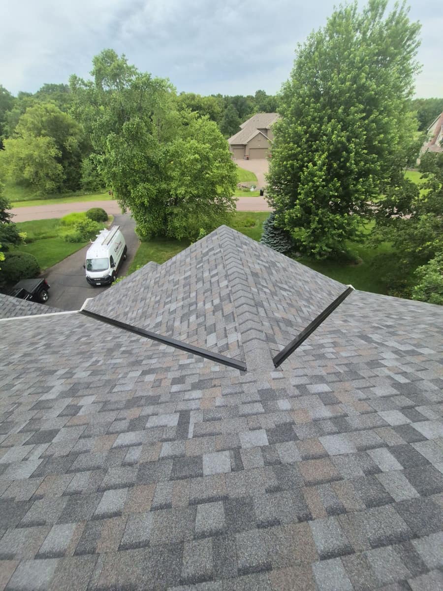 New shingle roof with metal valleys in Monticello, MN