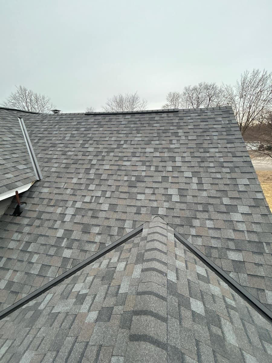 Completed shingle roof valleys in Monticello, MN