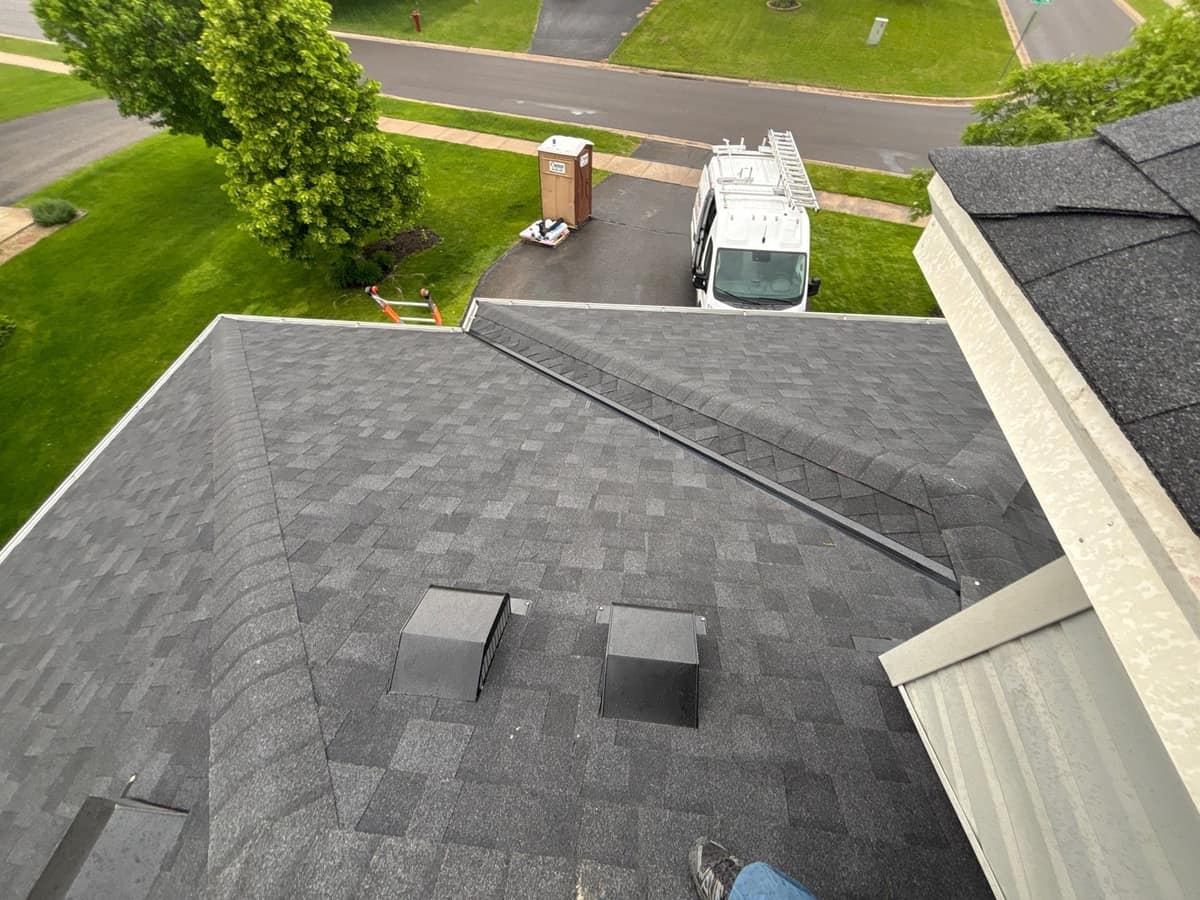 New gray shingle roof with box vents in Otsego, MN