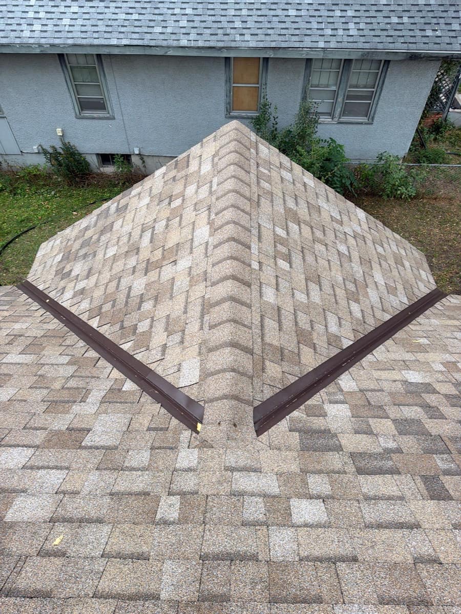 New architectural shingle hip roof with metal valleys on a St. Cloud, MN home