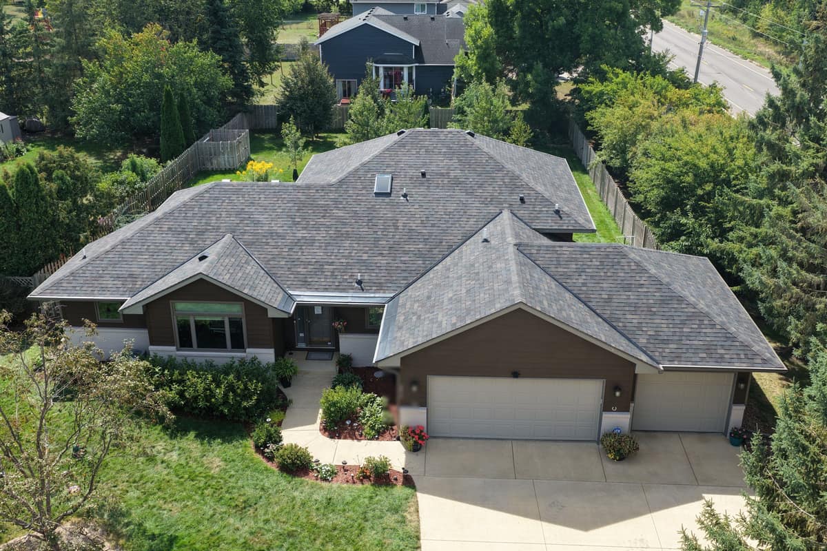 Drone view of a completed architectural shingle roof on a ranch home in St. Cloud, MN