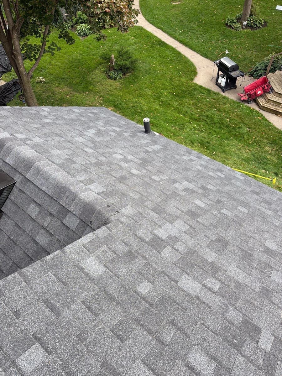 Completed shingle roof with pipe vent in Waite Park, MN