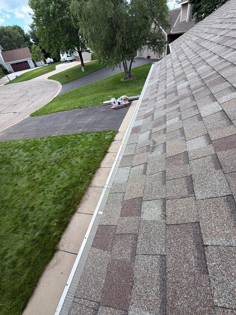 Finished shingle roof edge and gutter in Woodbury, MN