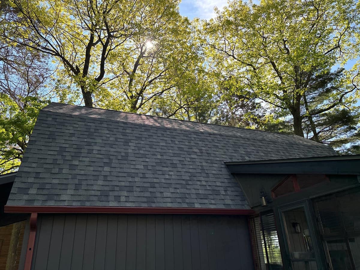 New shingle roof over the porch wing of the Crosslake cottage
