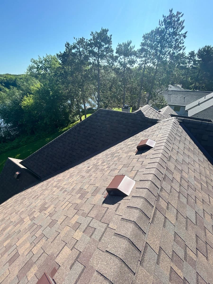 Roof vents along a new shingle hip on the Sartell home