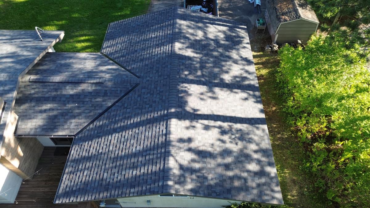 Drone view of the new shingle roof sections and valleys on the Sartell home