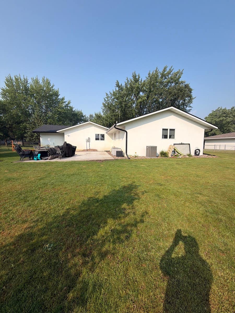 Back yard view of the St. Cloud home after the roof and gutter replacement
