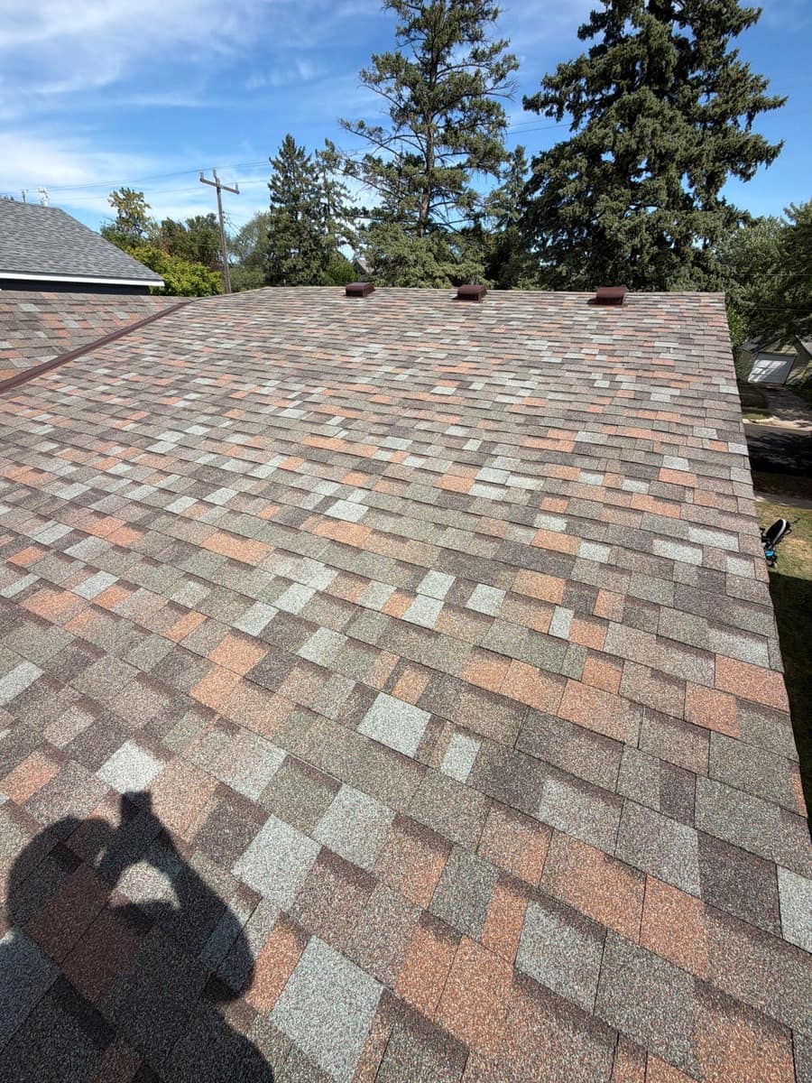 New multi-tone architectural shingles across the St. Cloud roof