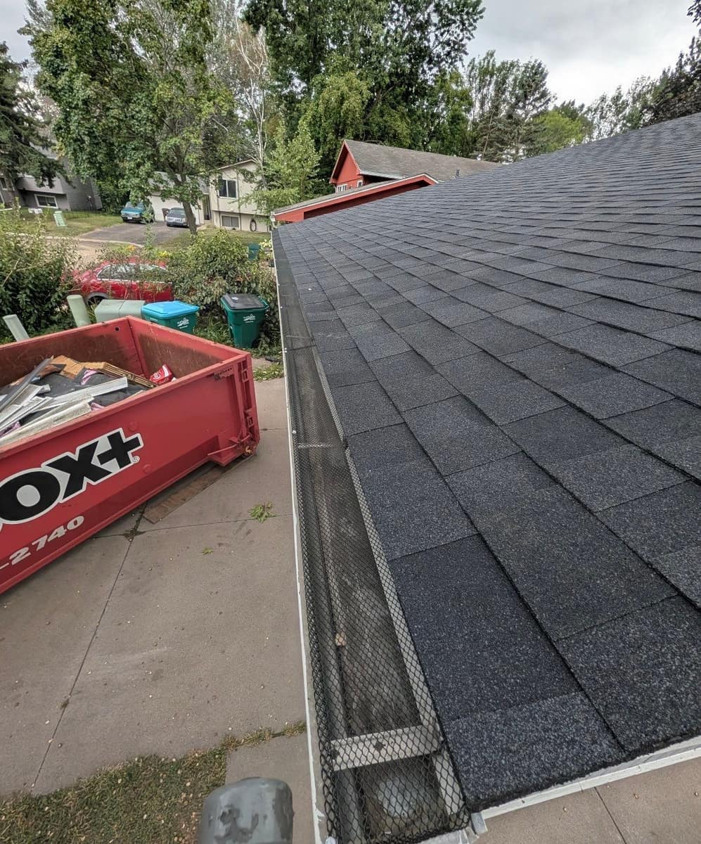 New shingle edge and covered gutter on the Woodbury home